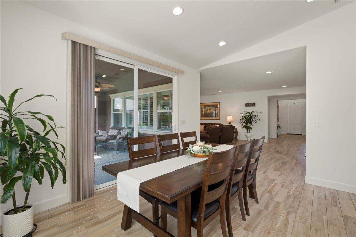 1188 Viognier Way Gilroy, CA 95020 - Photo 27 of 71 a dining room with furniture and wooden floor