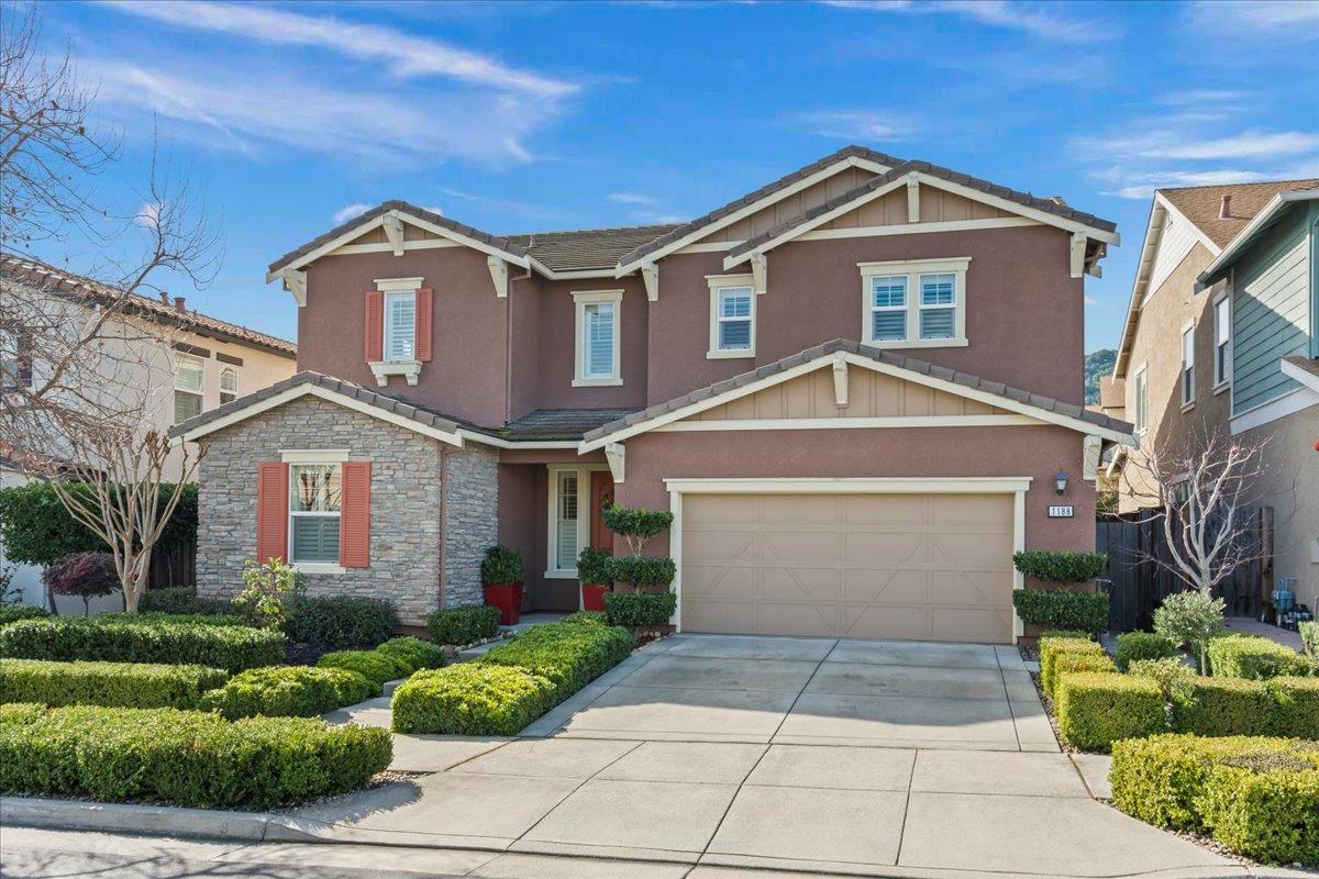 1188 Viognier Way Gilroy, CA 95020 - Photo 3 of 71 a front view of a house with garden