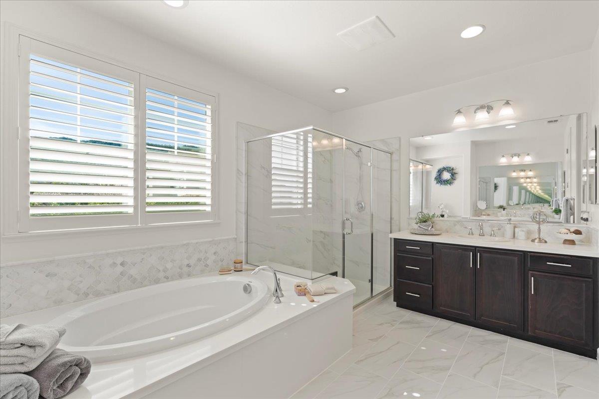 1188 Viognier Way Gilroy, CA 95020 - Photo 43 of 71 a spacious bathroom with a tub sink shower and mirror