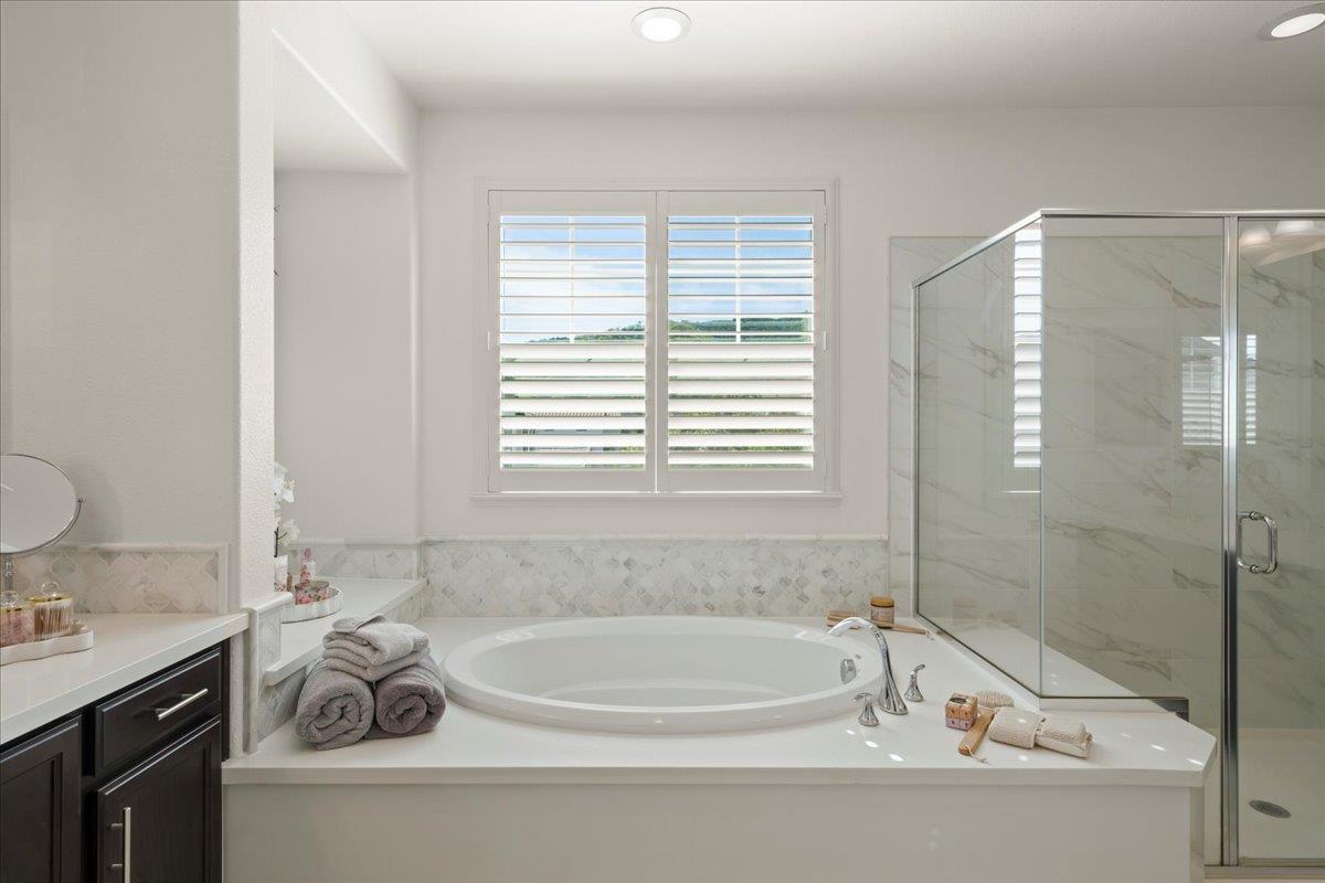 1188 Viognier Way Gilroy, CA 95020 - Photo 48 of 71 a white bath tub sitting next to a white sink