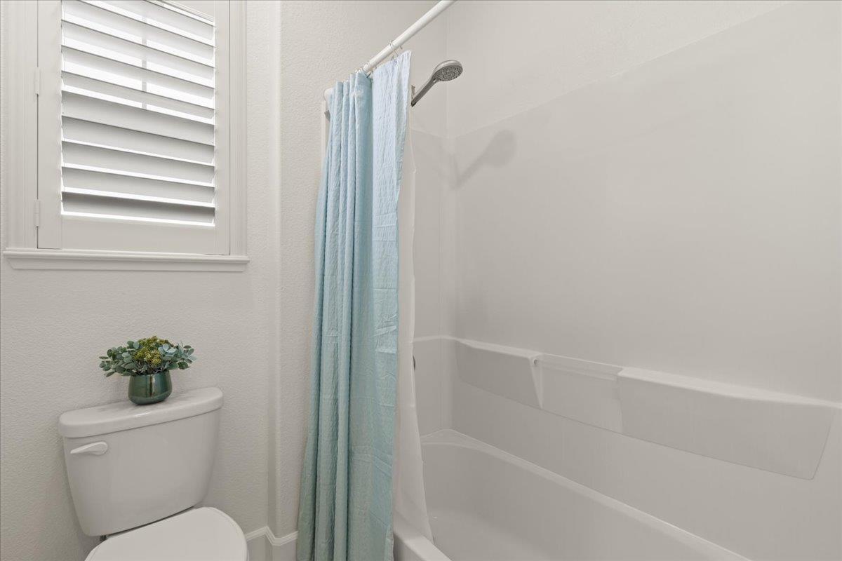1188 Viognier Way Gilroy, CA 95020 - Photo 52 of 71 a bathroom with a toilet and a shower