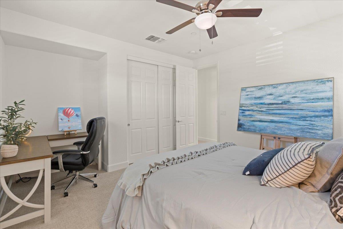 1188 Viognier Way Gilroy, CA 95020 - Photo 55 of 71 a bedroom with a bed and a desk
