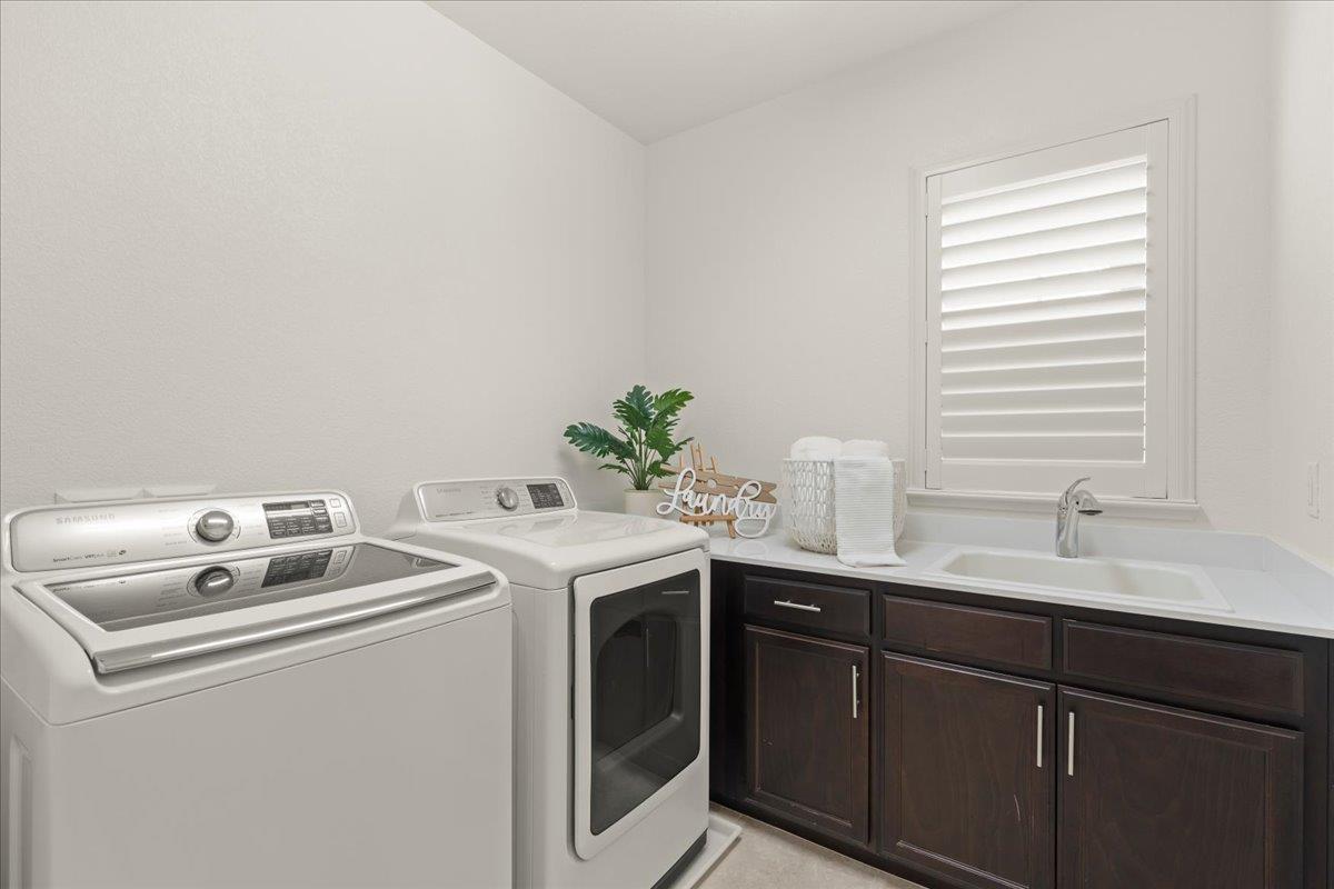 1188 Viognier Way Gilroy, CA 95020 - Photo 56 of 71 a utility room with sink dryer and washer