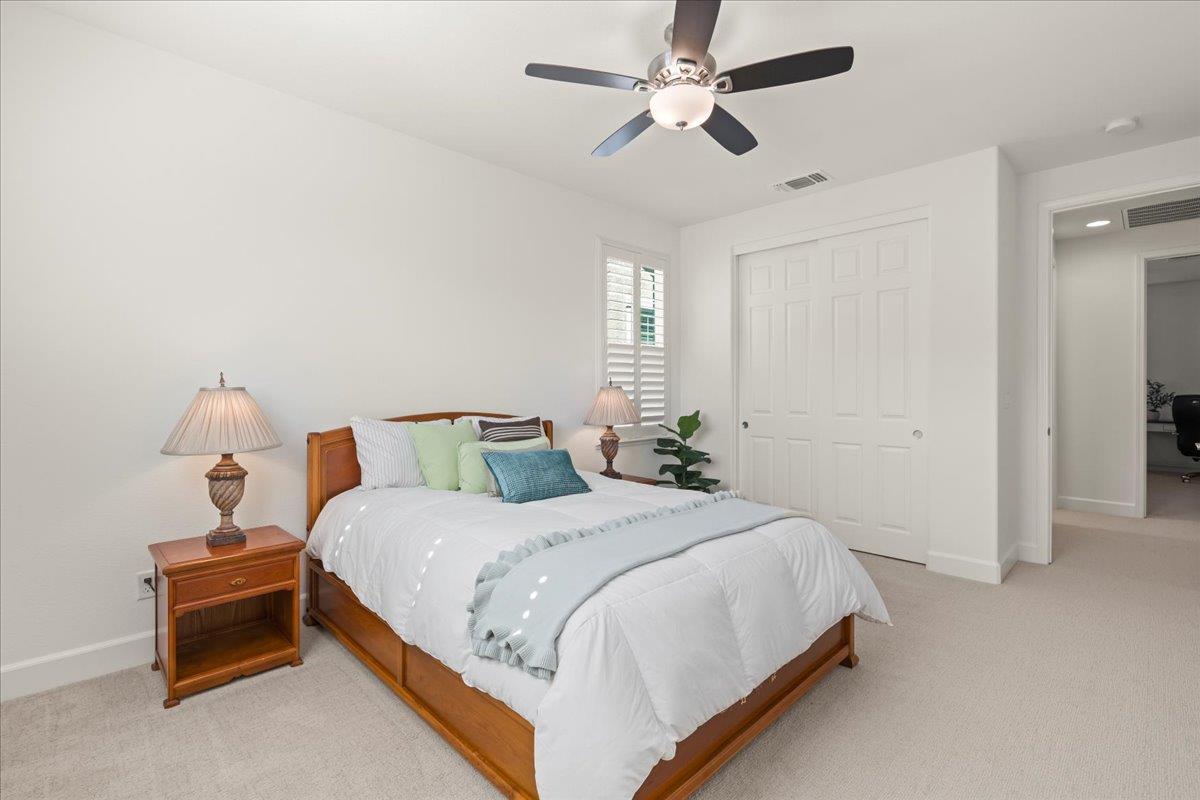 1188 Viognier Way Gilroy, CA 95020 - Photo 59 of 71 a bedroom with a bed and a ceiling fan