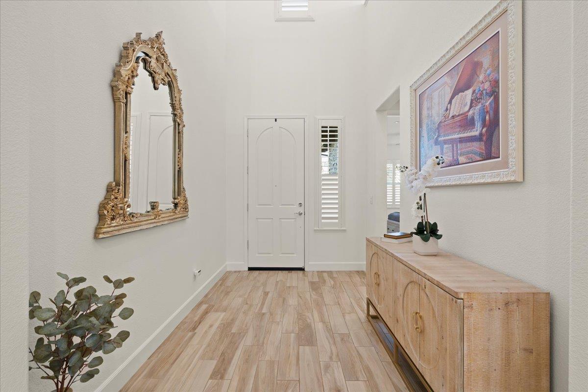 1188 Viognier Way Gilroy, CA 95020 - Photo 8 of 71 a view of a room with wooden floor and window