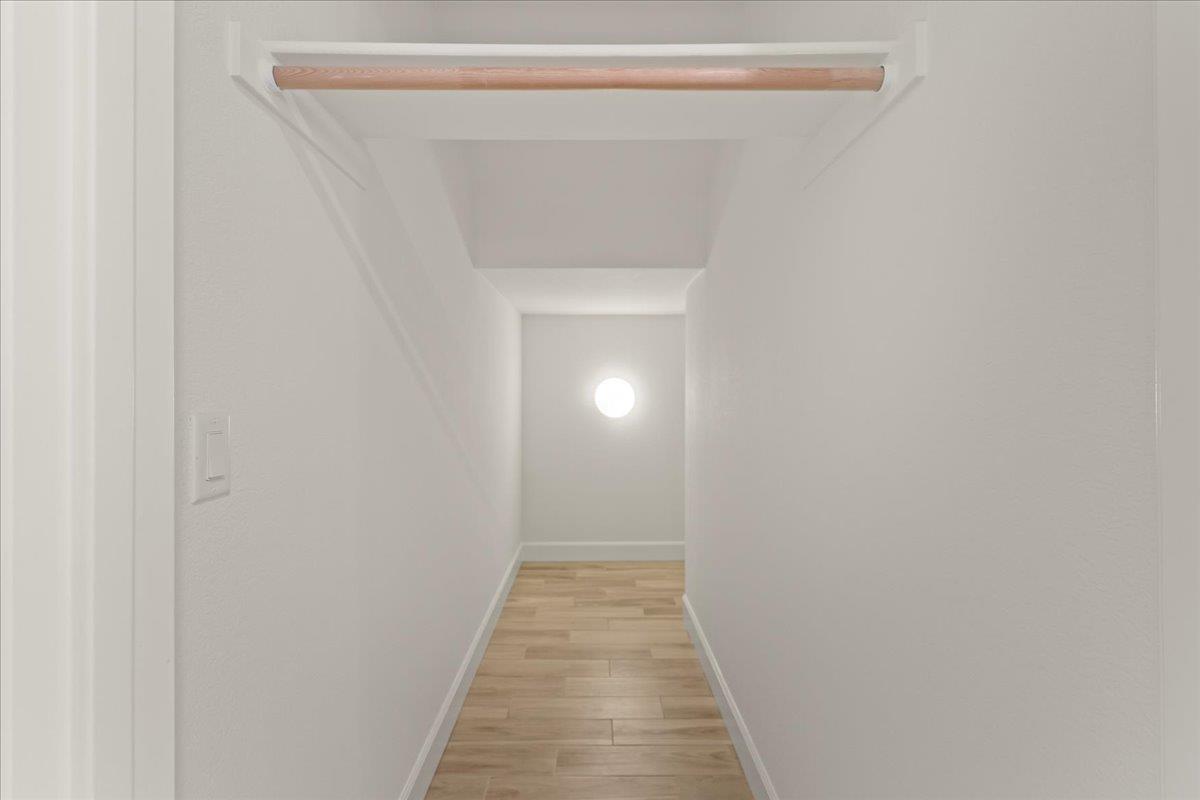 1188 Viognier Way Gilroy, CA 95020 - Photo 9 of 71 a view of a hallway with wooden floor