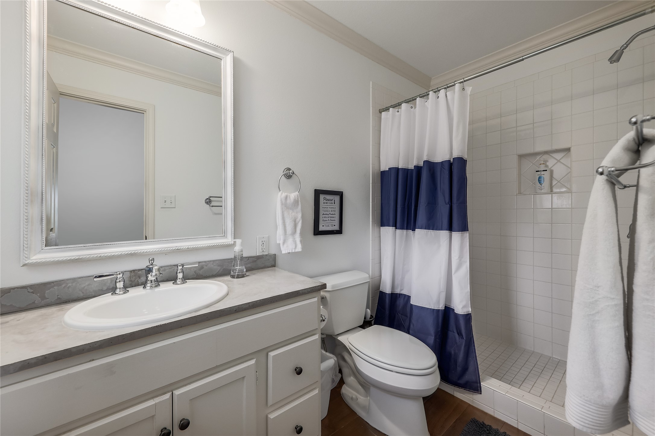 525 Ellen Williams Loop Kingsland, TX 78639 - Photo 32 of 36 a bathroom with a sink toilet and shower