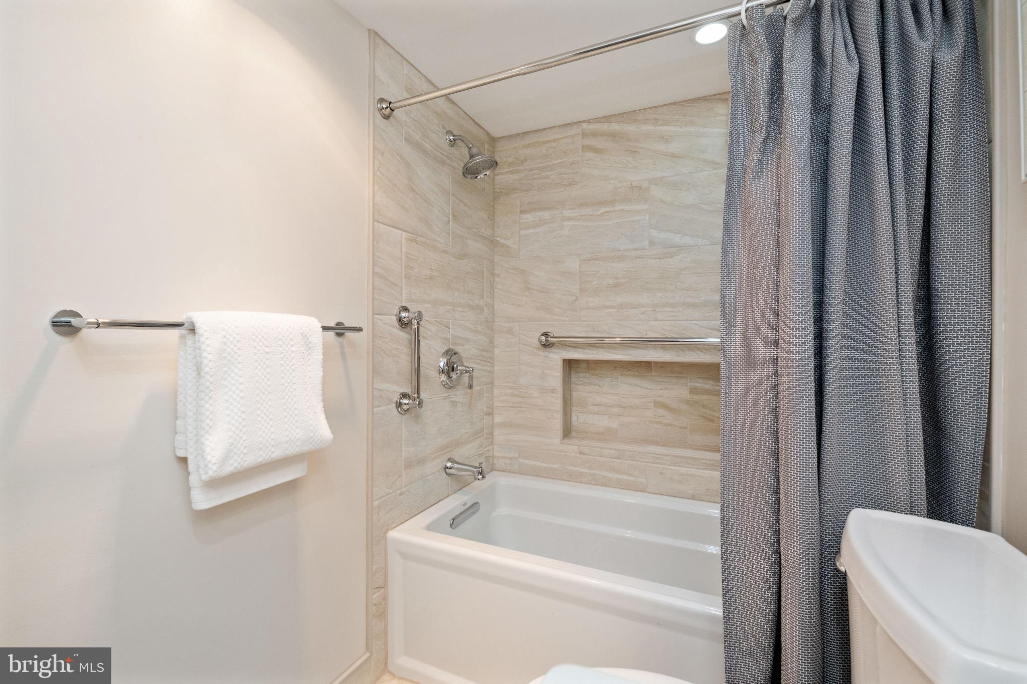 205 East Joppa Road, Unit 2009 Towson, MD 21286 - Photo 17 of 28 Modern bathroom with elegant tile accents.