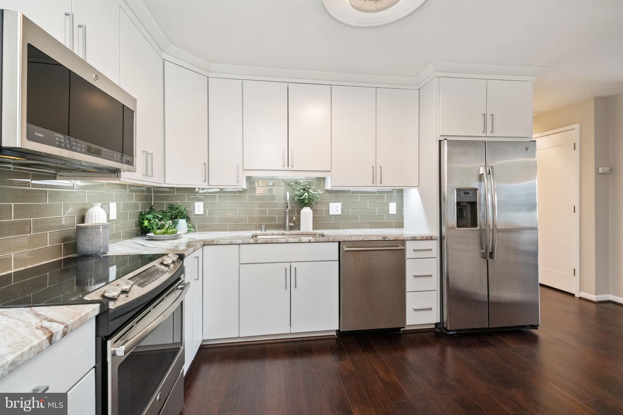 205 East Joppa Road, Unit 2009 Towson, MD 21286 - Photo 4 of 28 Modern kitchen with sleek finishes.