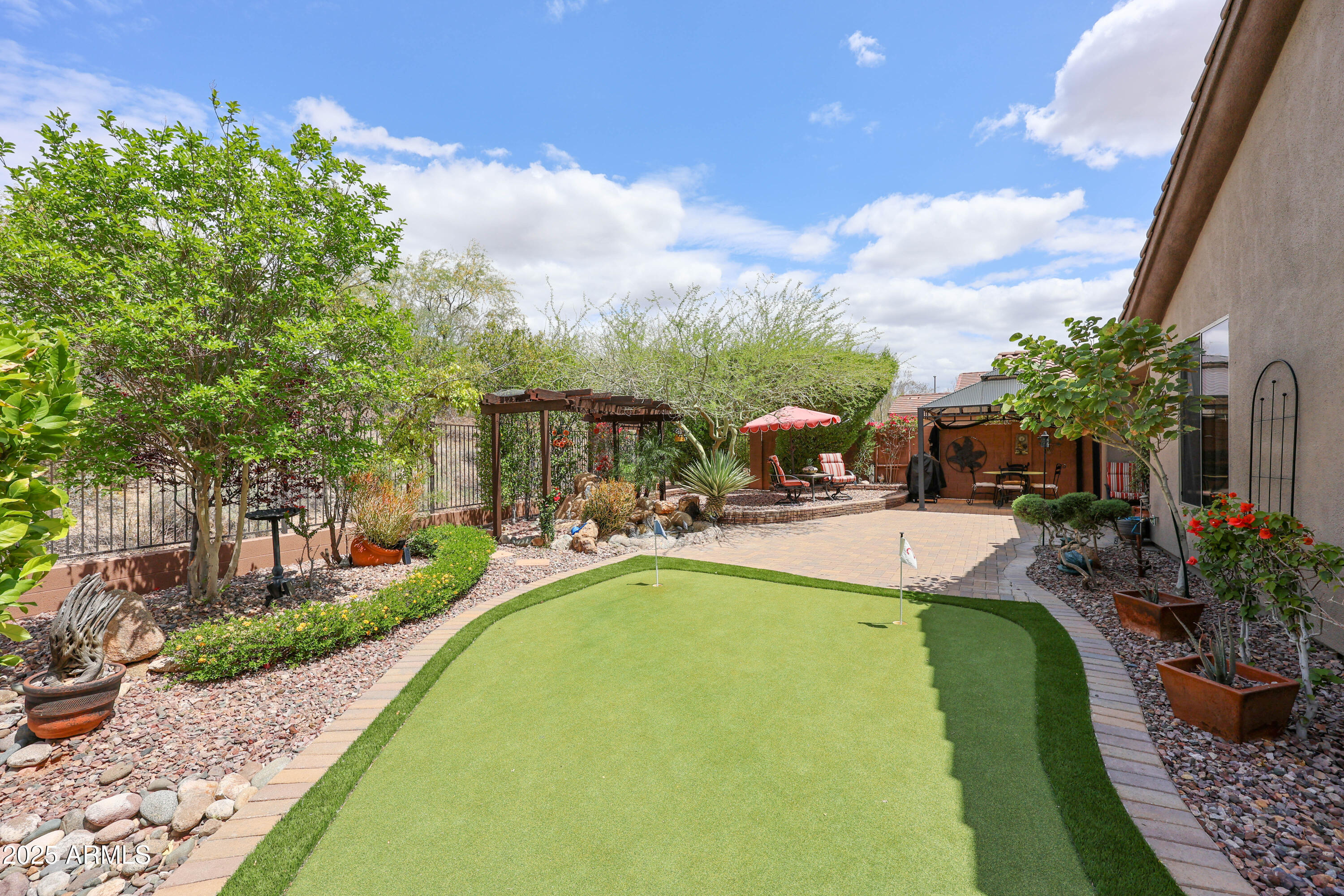 1916 West Spirit Court Anthem, AZ 85086 - Photo 10 of 43 a view of a swimming pool with sitting area