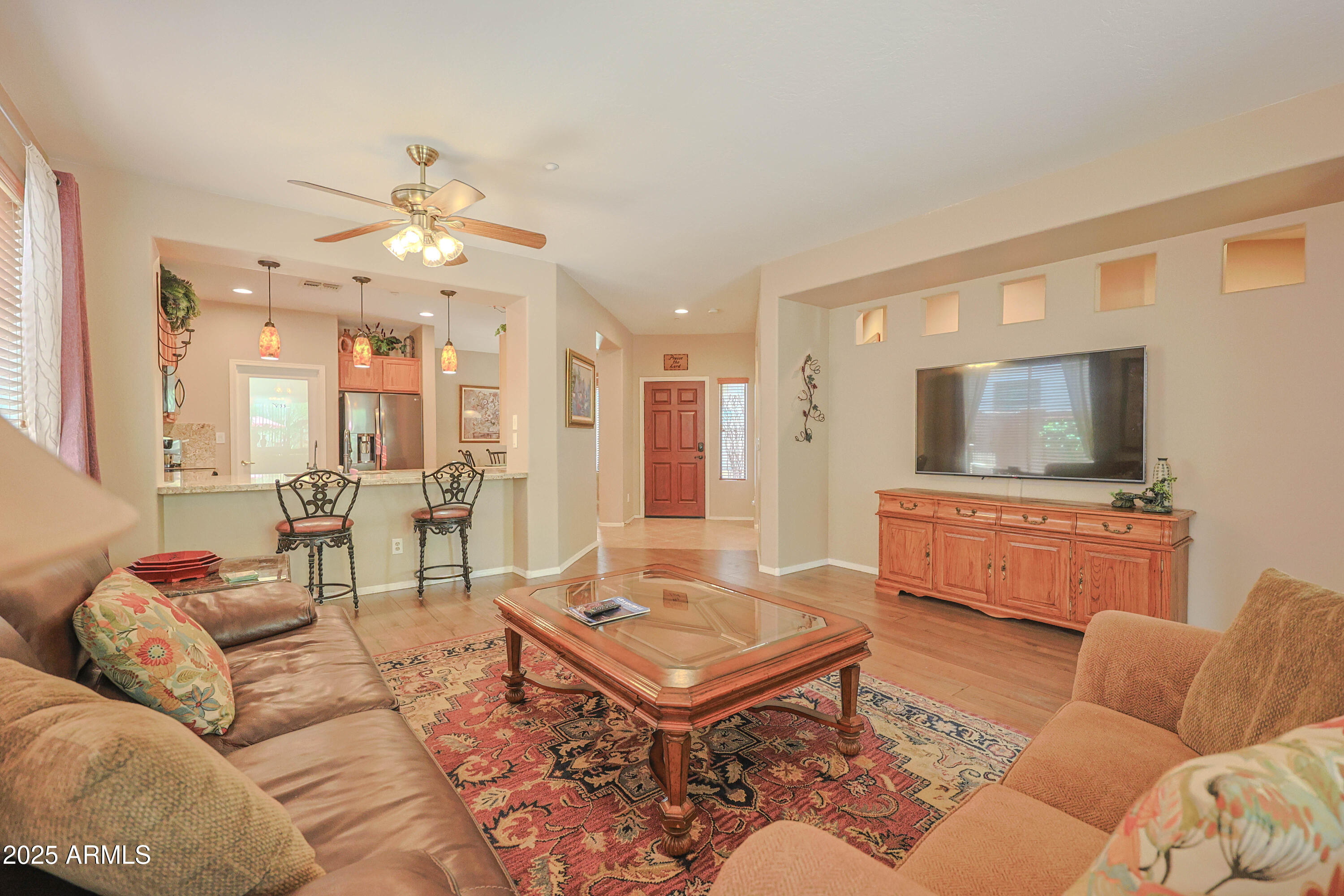 1916 West Spirit Court Anthem, AZ 85086 - Photo 14 of 43 a living room with furniture and a flat screen tv