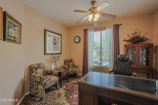 a dining room with furniture and window
