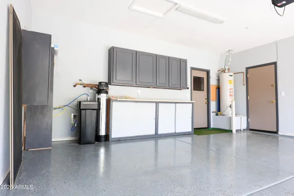 a kitchen with stainless steel appliances a refrigerator and a sink