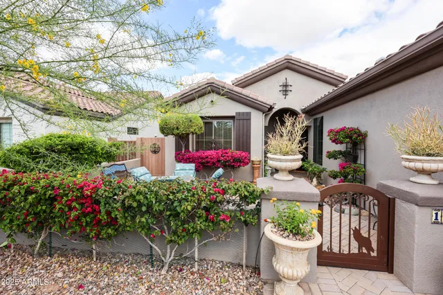 a front view of house with yard and seating area