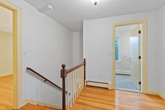 a bedroom with a bed and a view of bedroom