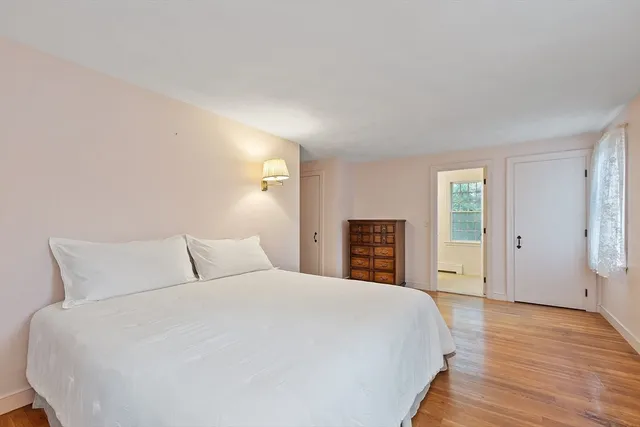 a bathroom with a sink toilet and mirror