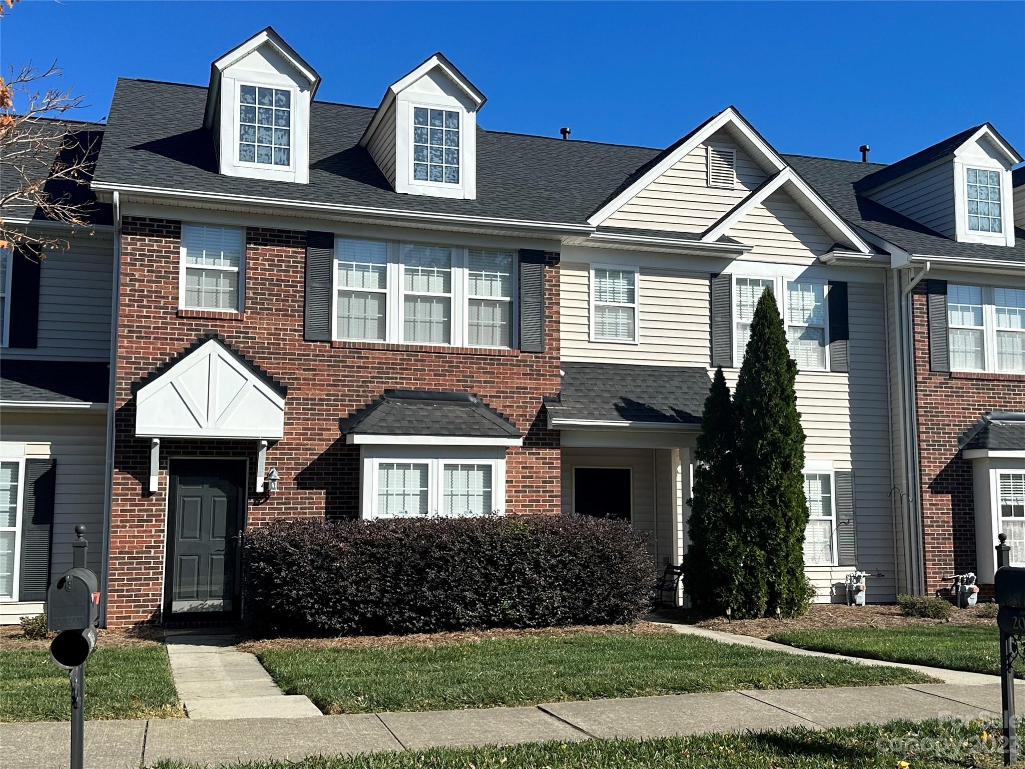 2049 Twilight Lane Monroe, NC 28110 - Photo 1 of 44 a front view of a house with a yard