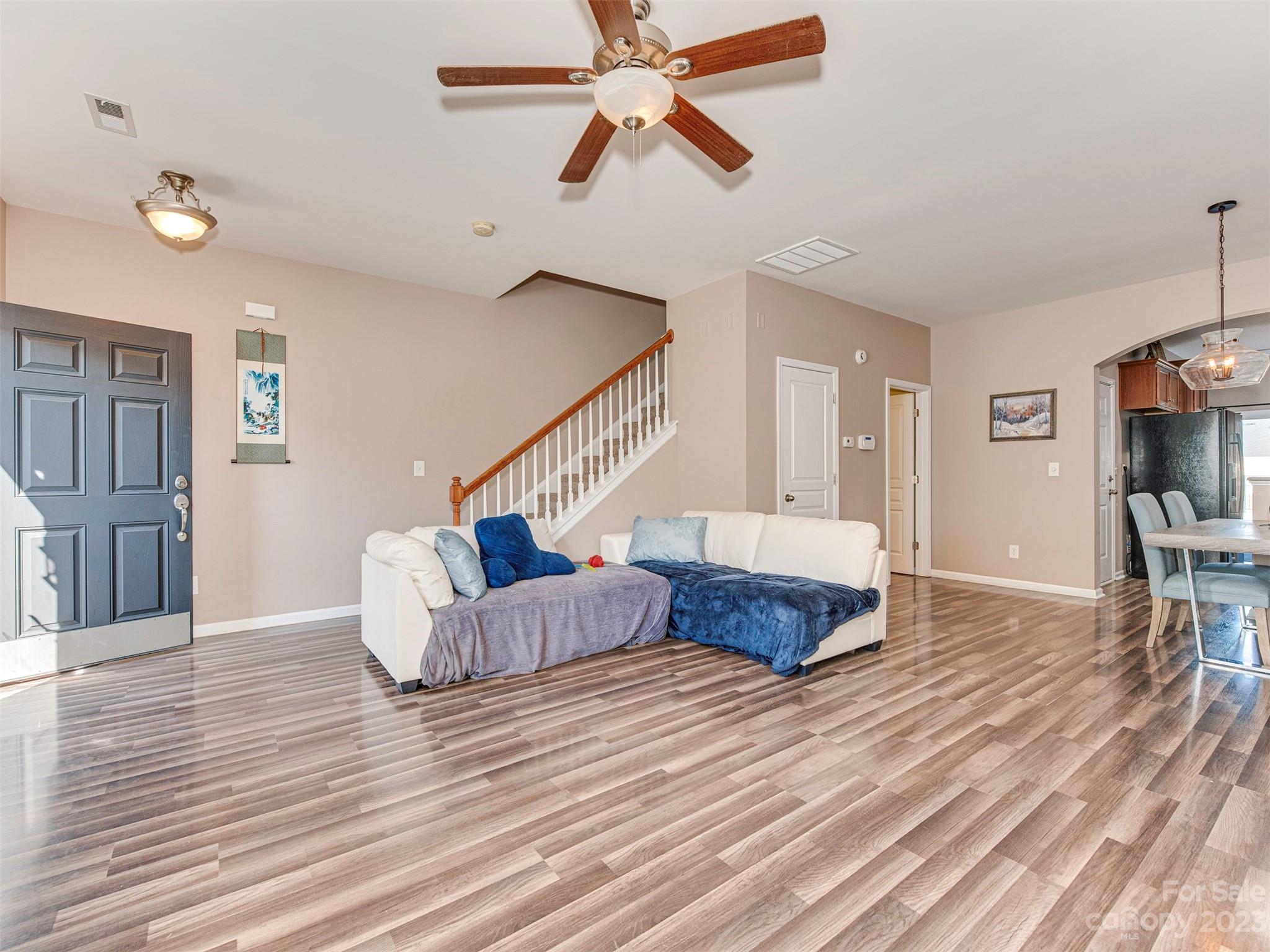 2049 Twilight Lane Monroe, NC 28110 - Photo 11 of 44 a living room with furniture and a wooden floor