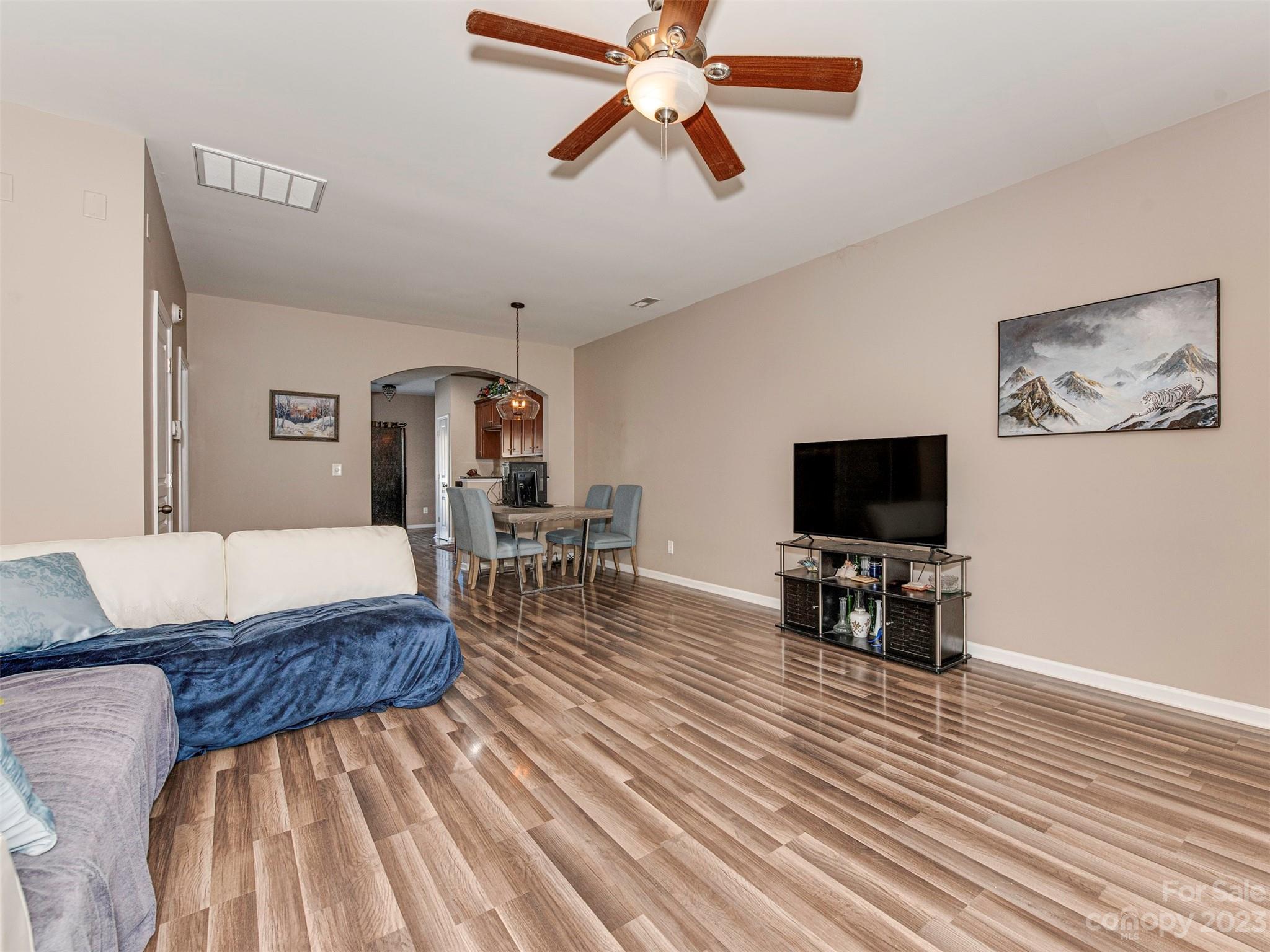 2049 Twilight Lane Monroe, NC 28110 - Photo 14 of 44 a living room with furniture and a flat screen tv