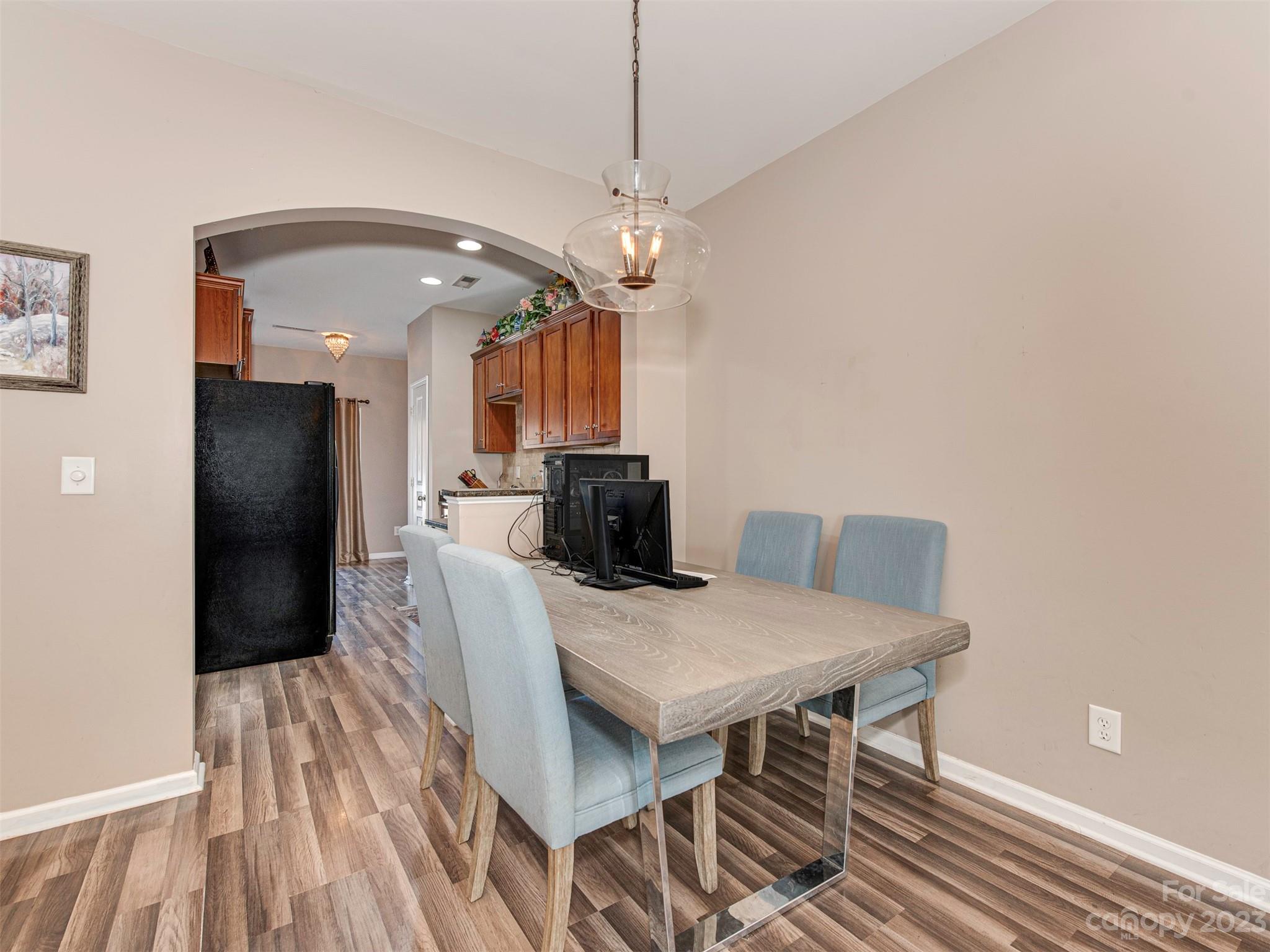 2049 Twilight Lane Monroe, NC 28110 - Photo 15 of 44 a view of a dining room with furniture