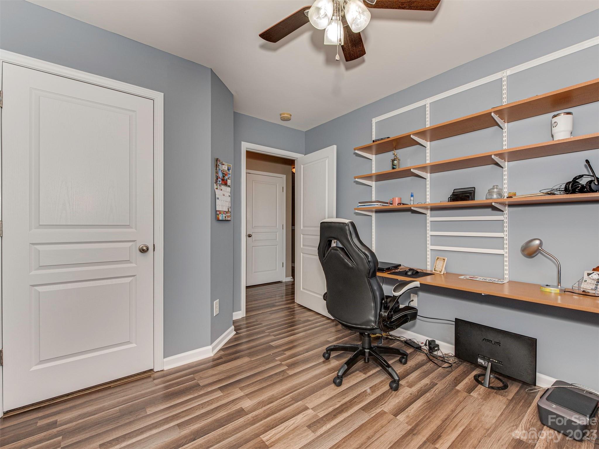 2049 Twilight Lane Monroe, NC 28110 - Photo 30 of 44 a view of a workspace with furniture and a window