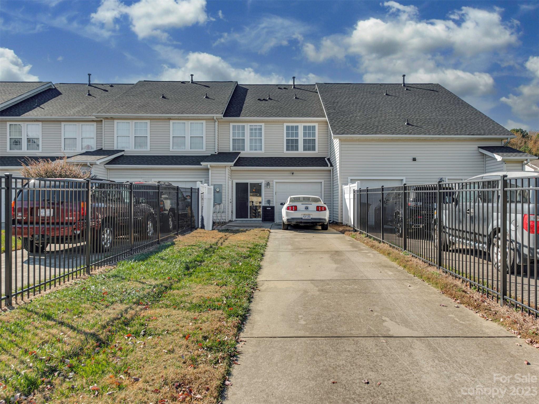 2049 Twilight Lane Monroe, NC 28110 - Photo 35 of 44 a view of multiple houses with a yard