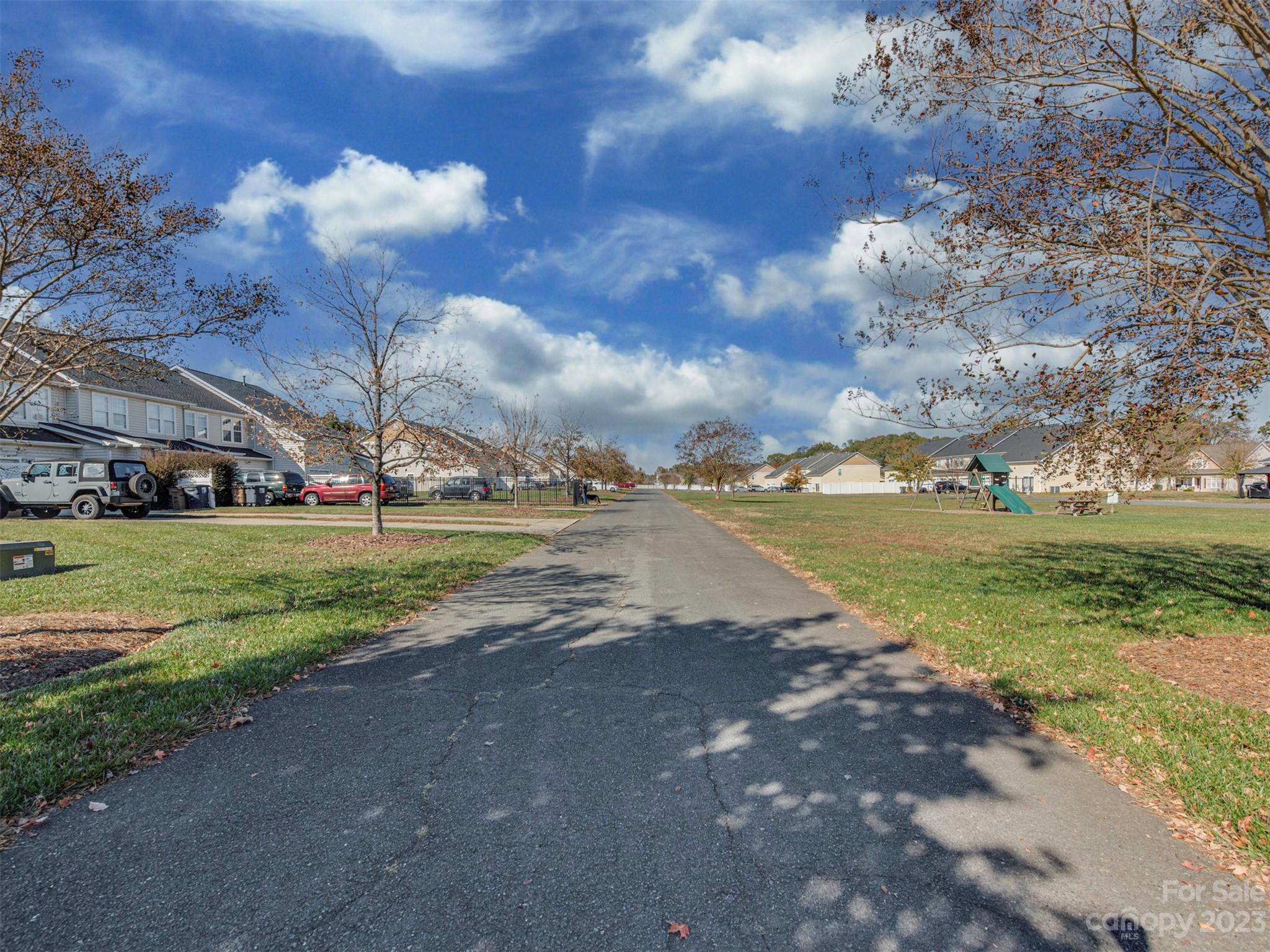 2049 Twilight Lane Monroe, NC 28110 - Photo 40 of 44 a view of a playground with basketball court