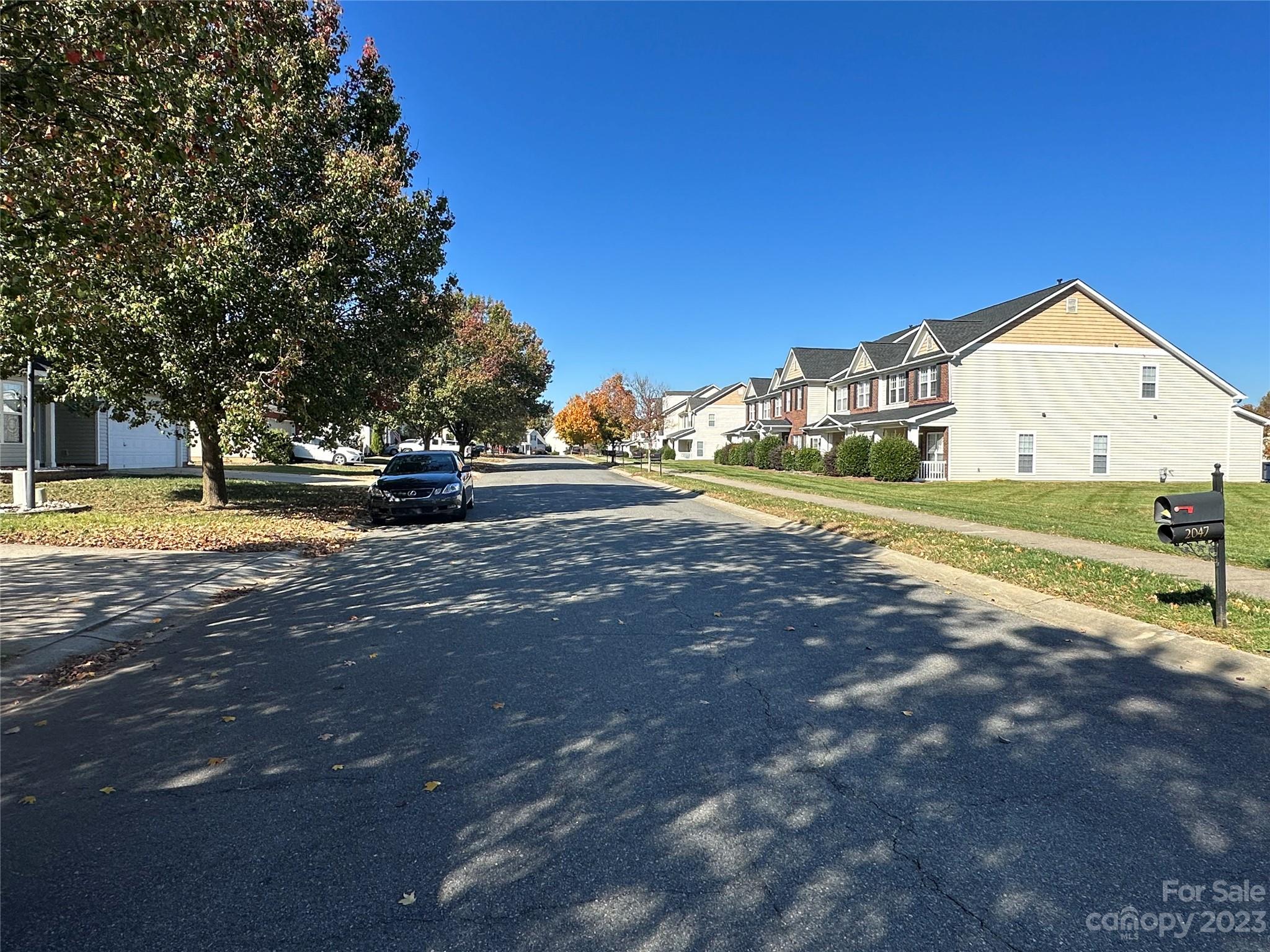 2049 Twilight Lane Monroe, NC 28110 - Photo 7 of 44 a view of big yard with a house in the background