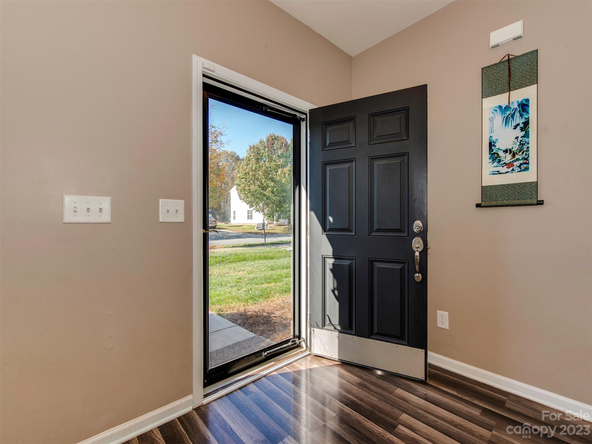 2049 Twilight Lane Monroe, NC 28110 - Photo 10 of 44 a view of front door with wooden floor