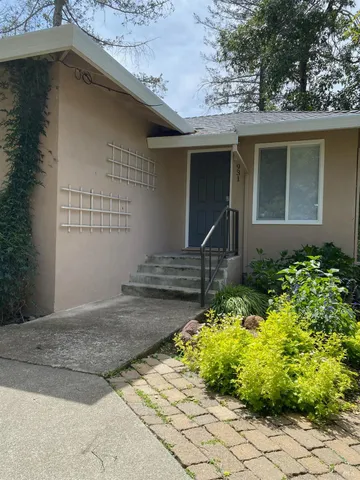 a front view of house with yard