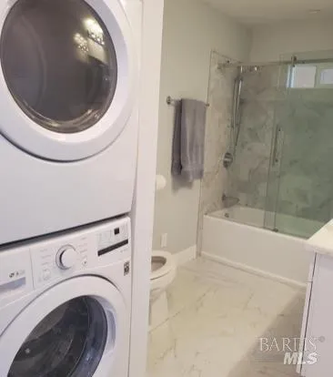 a bathroom with a bathtub and mirror