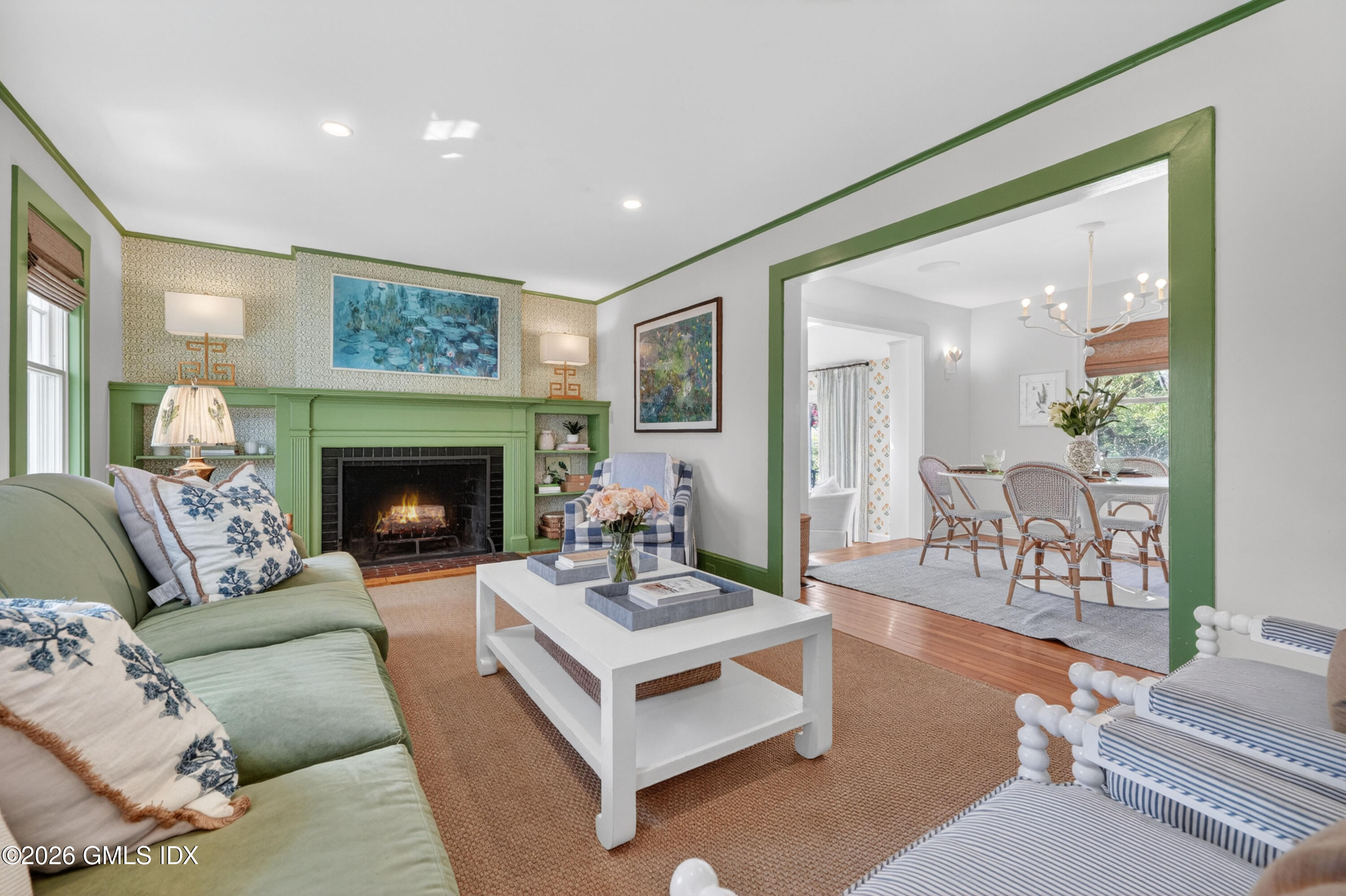 20 Ridge Road Cos Cob, CT 06807 - Photo 8 of 36 a living room with furniture and a fireplace