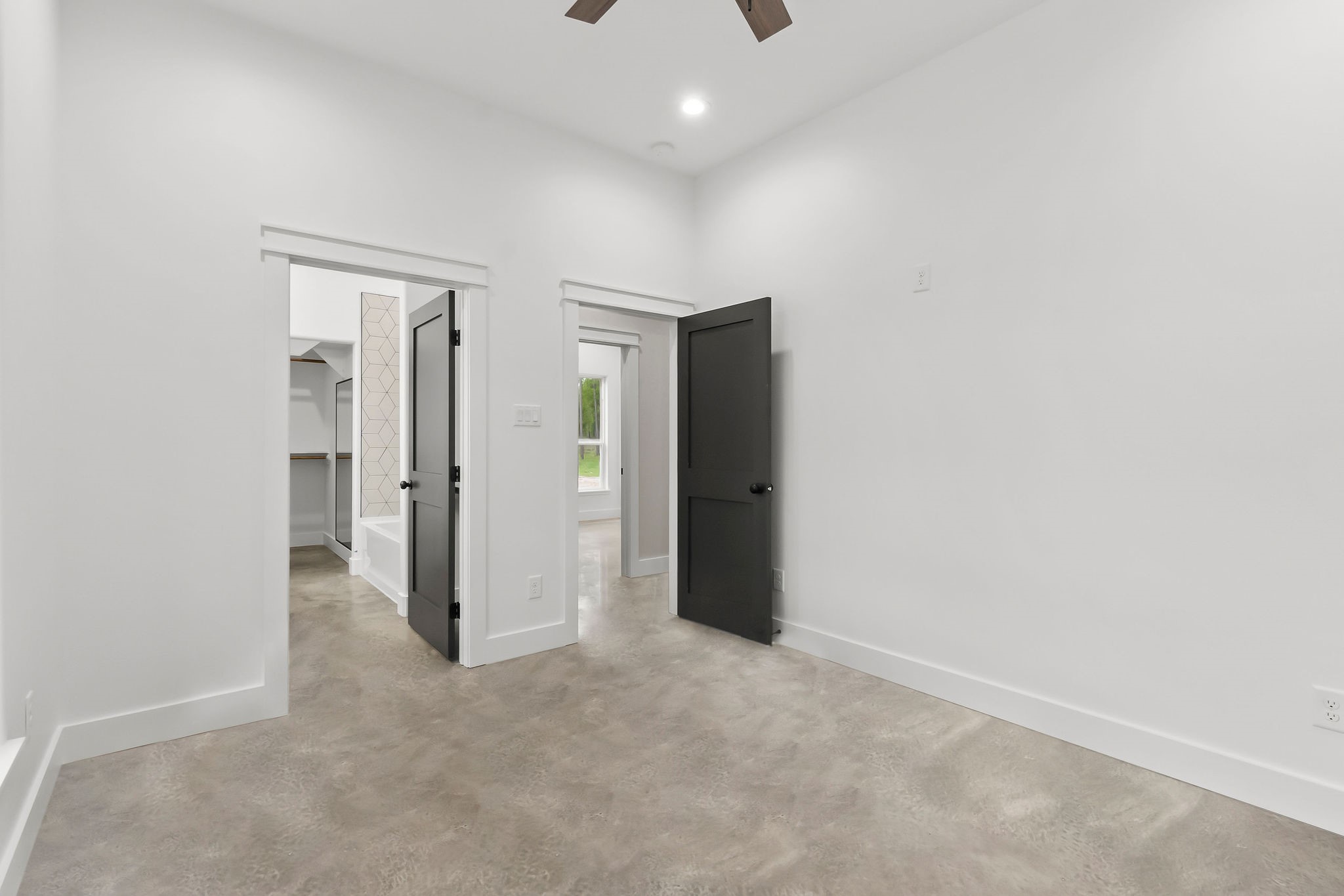 393 Hanson Road Onalaska, TX 77360 - Photo 19 of 38 an empty room with a cabinet and a mirror