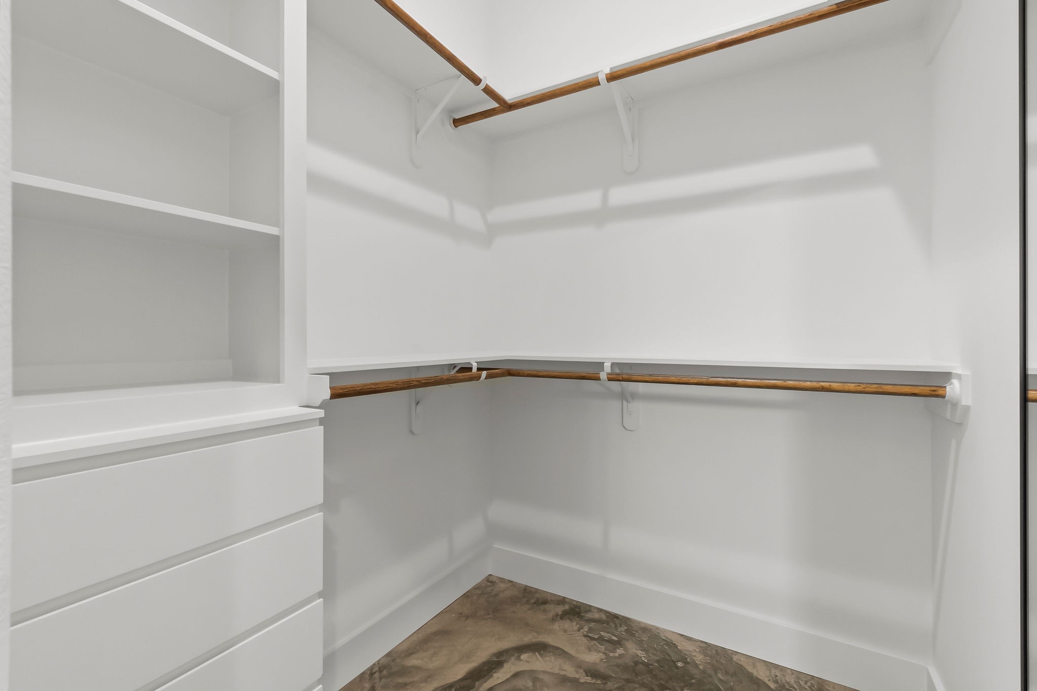 393 Hanson Road Onalaska, TX 77360 - Photo 22 of 38 a view of a room with racks on the wall