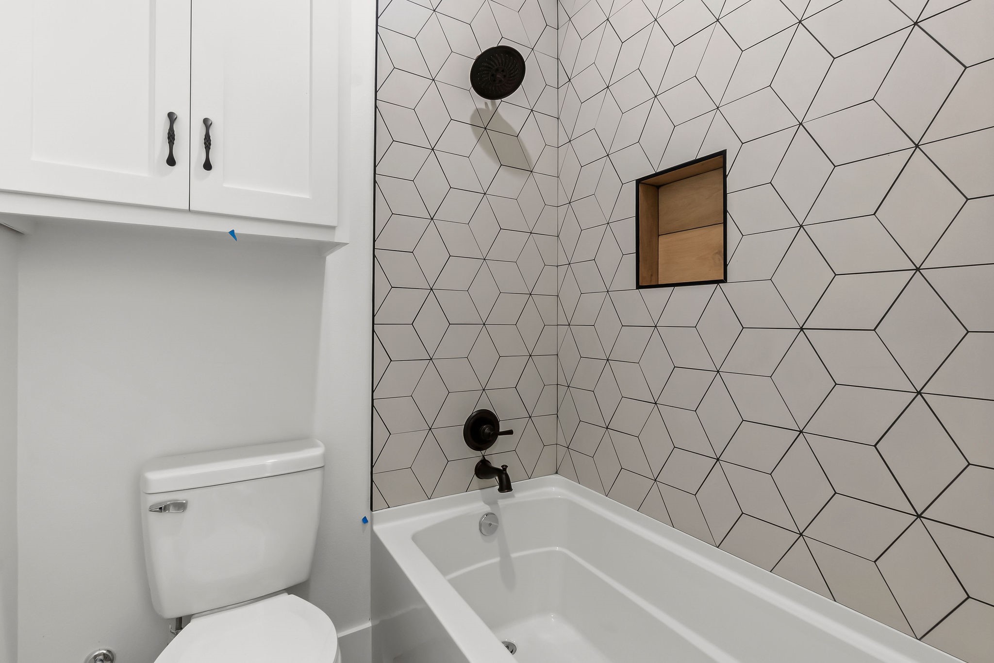 393 Hanson Road Onalaska, TX 77360 - Photo 26 of 38 a bathroom with a toilet and a sink