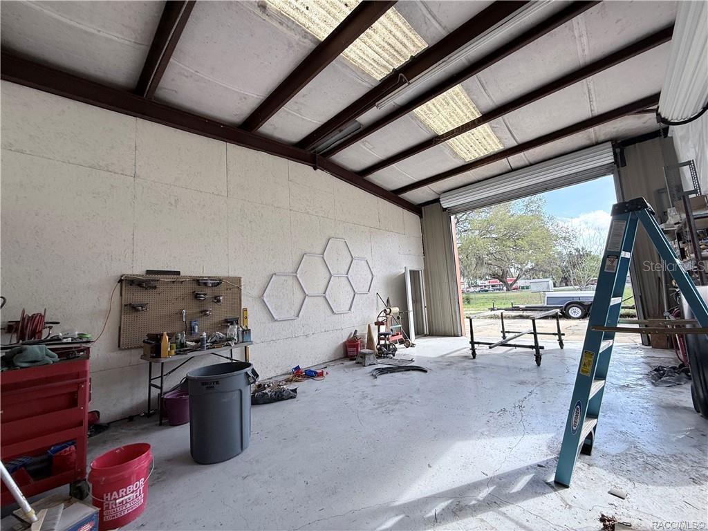 8 Highway 19 Inglis, FL 34449 - Photo 16 of 37 a room with lots of furniture and windows