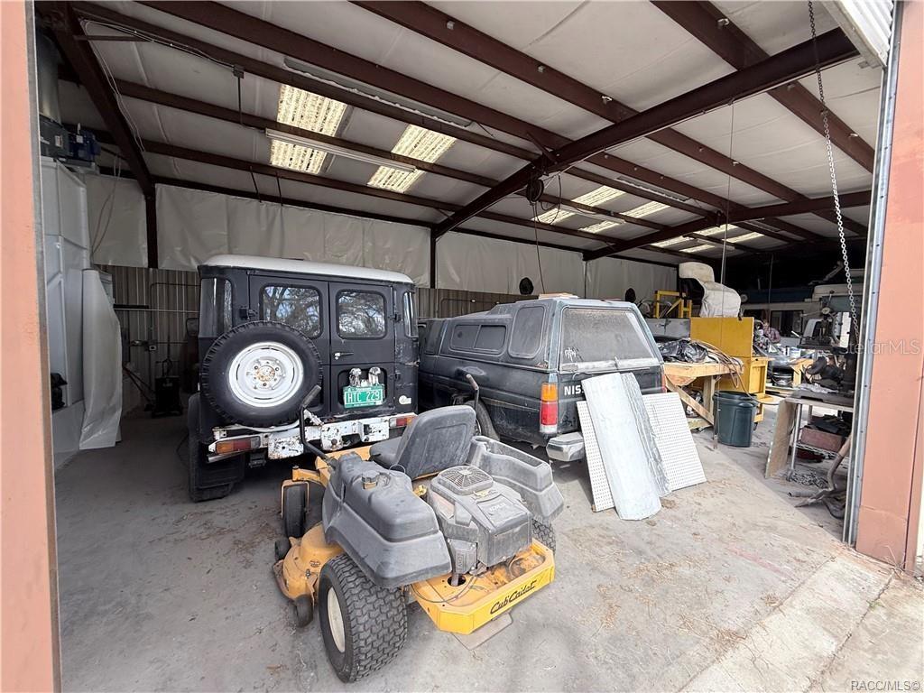 8 Highway 19 Inglis, FL 34449 - Photo 17 of 37 a storage room with furniture