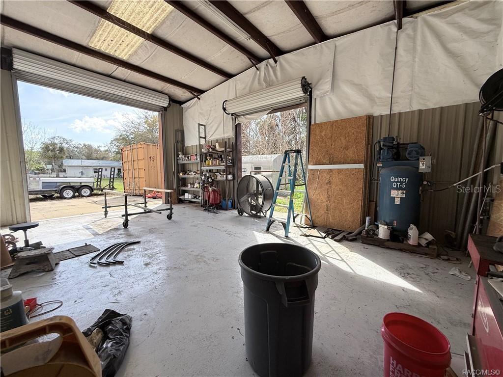 8 Highway 19 Inglis, FL 34449 - Photo 20 of 37 a room with gym equipment and a large window