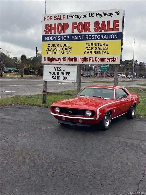 8 Highway 19 Inglis, FL 34449 - Photo 2 of 37 a swing on the side of a road