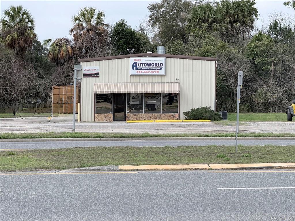 8 Highway 19 Inglis, FL 34449 - Photo 3 of 37 a view of a house with a swimming pool