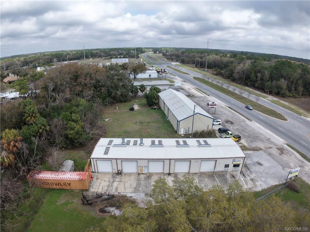 8 Highway 19 Inglis, FL 34449 - Photo 31 of 37 an aerial view of a house with a yard