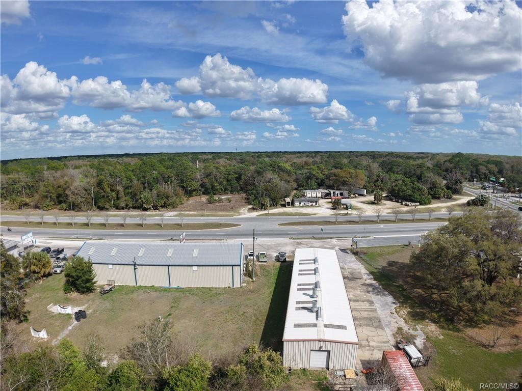 8 Highway 19 Inglis, FL 34449 - Photo 33 of 37 a view of a swimming pool and an outdoor seating