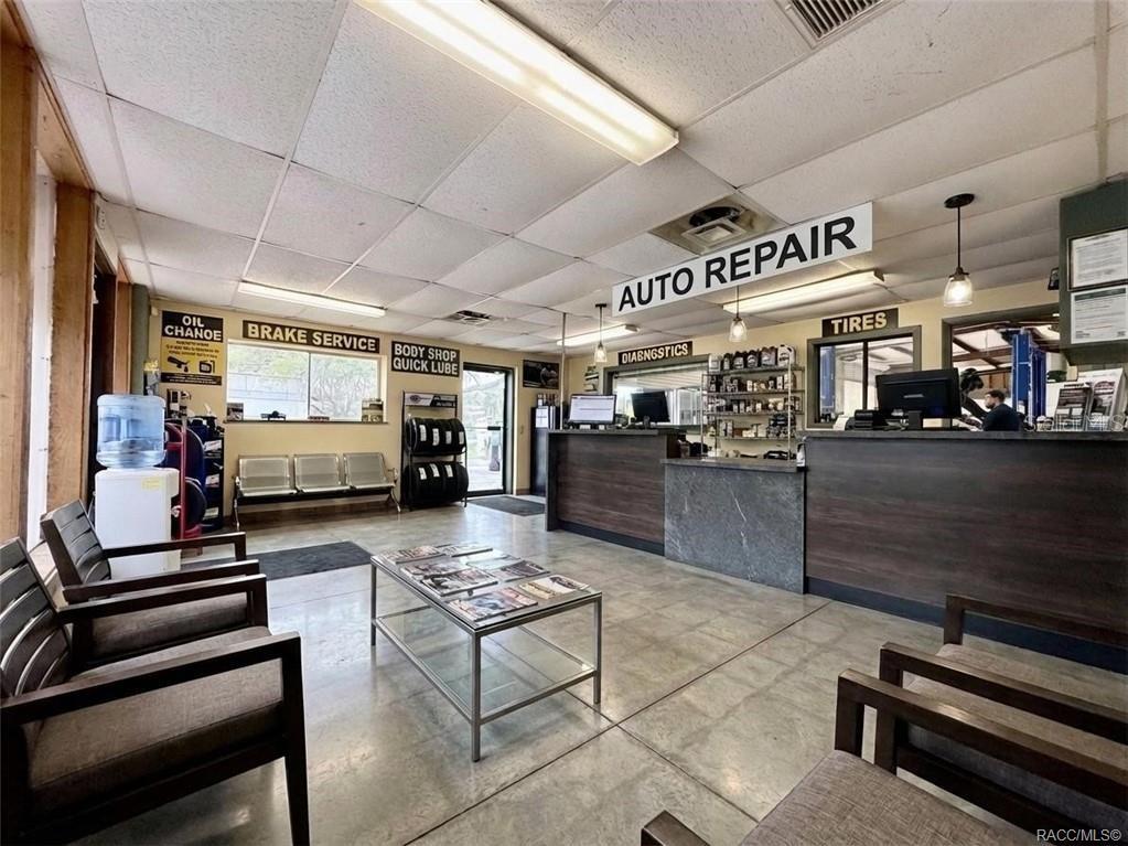 8 Highway 19 Inglis, FL 34449 - Photo 4 of 37 a living room with lots of furniture and kitchen view