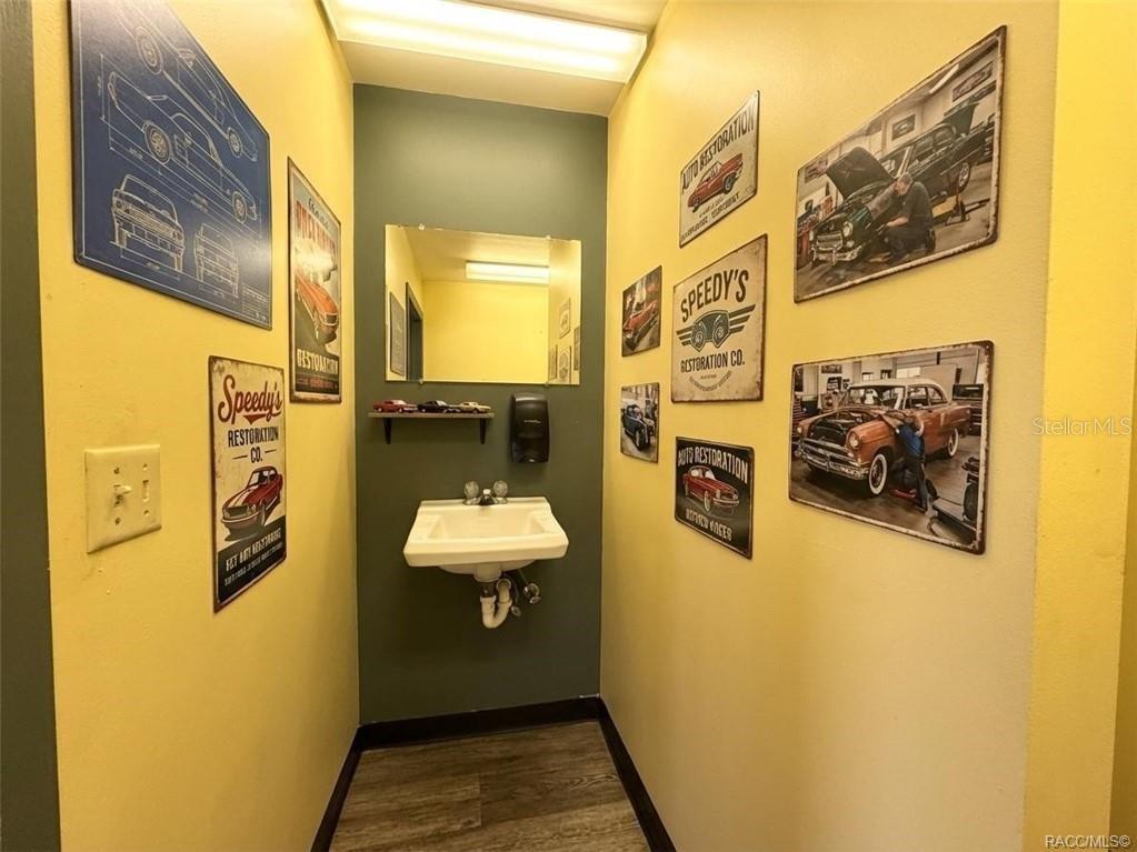8 Highway 19 Inglis, FL 34449 - Photo 5 of 37 a bathroom with a sink and a mirror