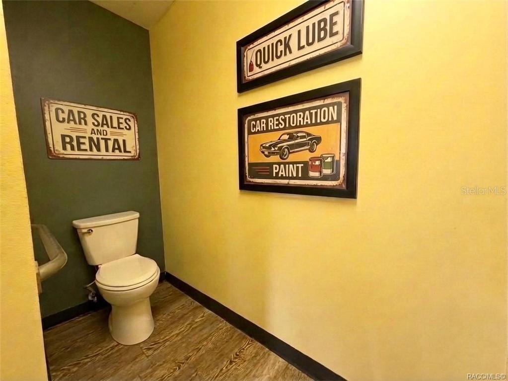 8 Highway 19 Inglis, FL 34449 - Photo 6 of 37 a sign that is on the wall