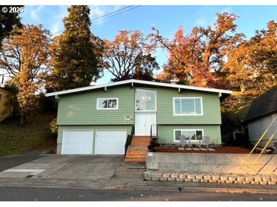 552 West D Street Springfield, OR 97477 - Photo 2 of 29 a front view of a house with a yard