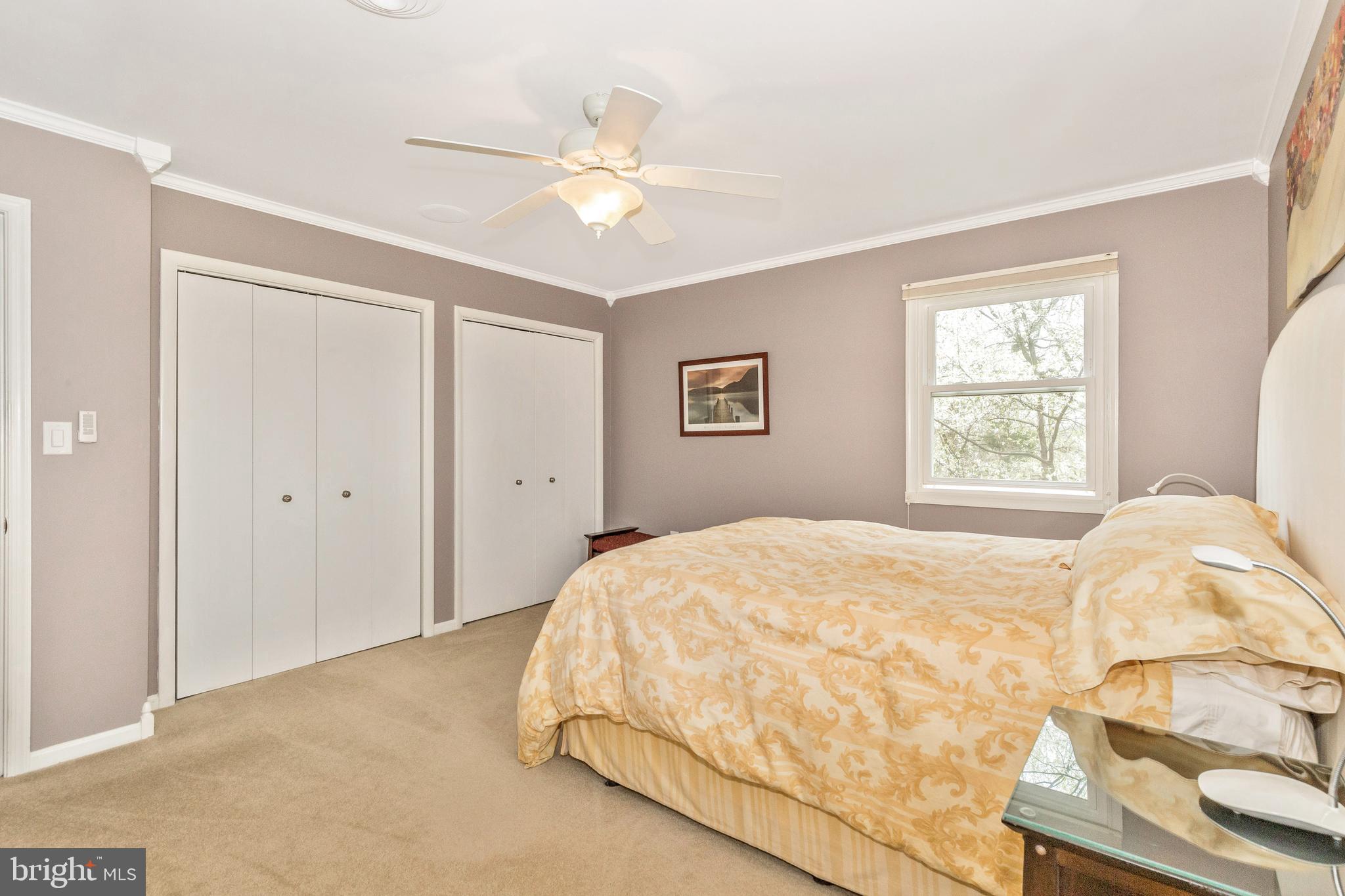 5506 Woodlyn Road Frederick, MD 21703 - Photo 21 of 51 a bedroom with a bed and window