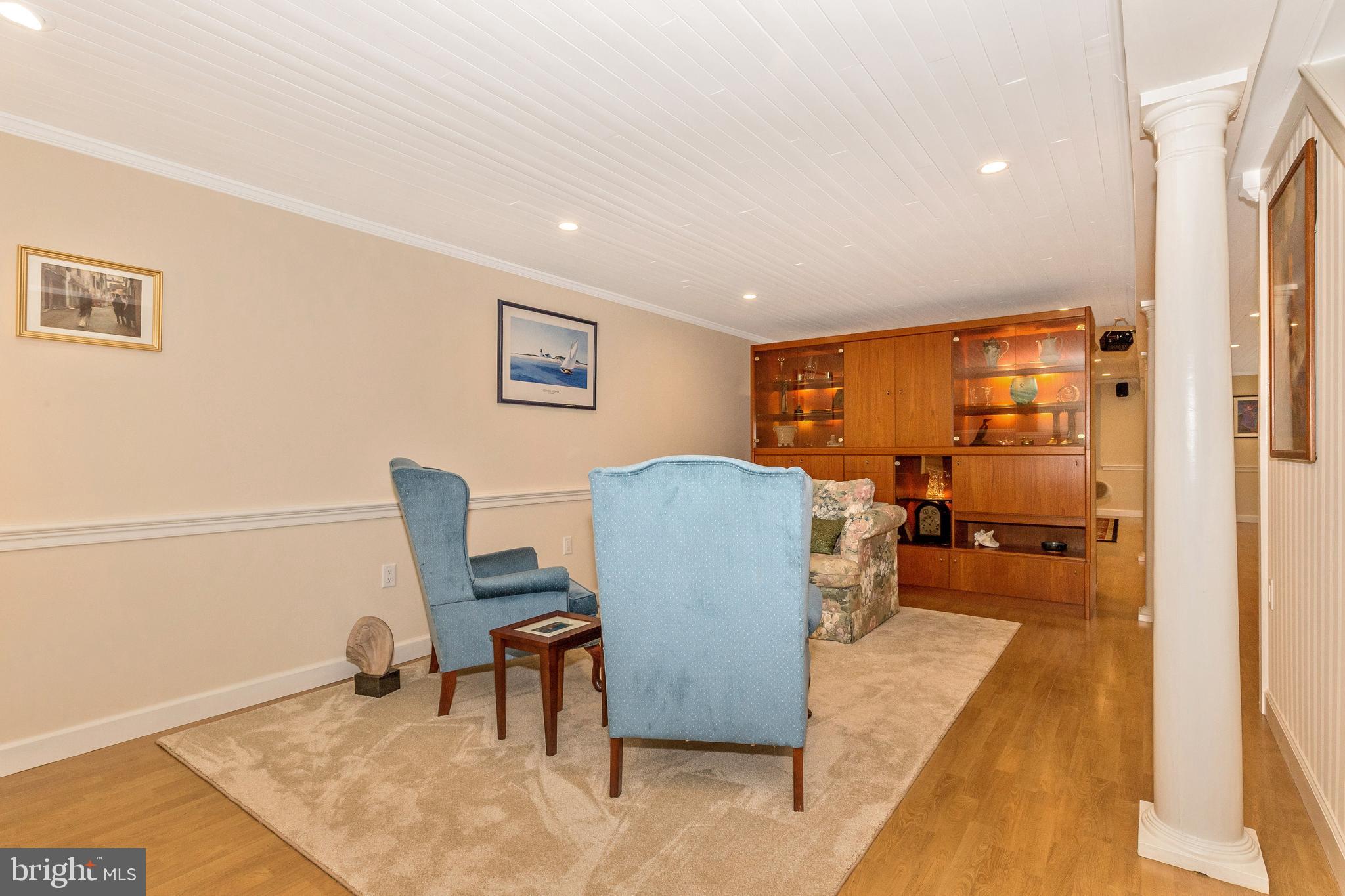 5506 Woodlyn Road Frederick, MD 21703 - Photo 28 of 51 a living room with furniture and a couch