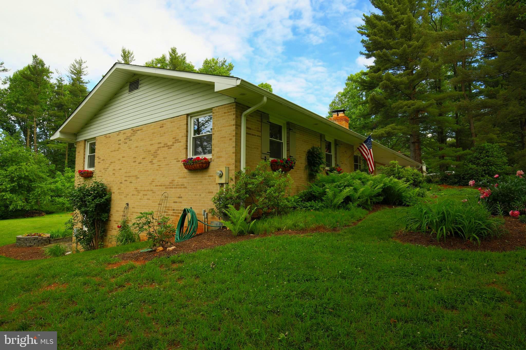 5506 Woodlyn Road Frederick, MD 21703 - Photo 41 of 51 a front view of house with yard and green space