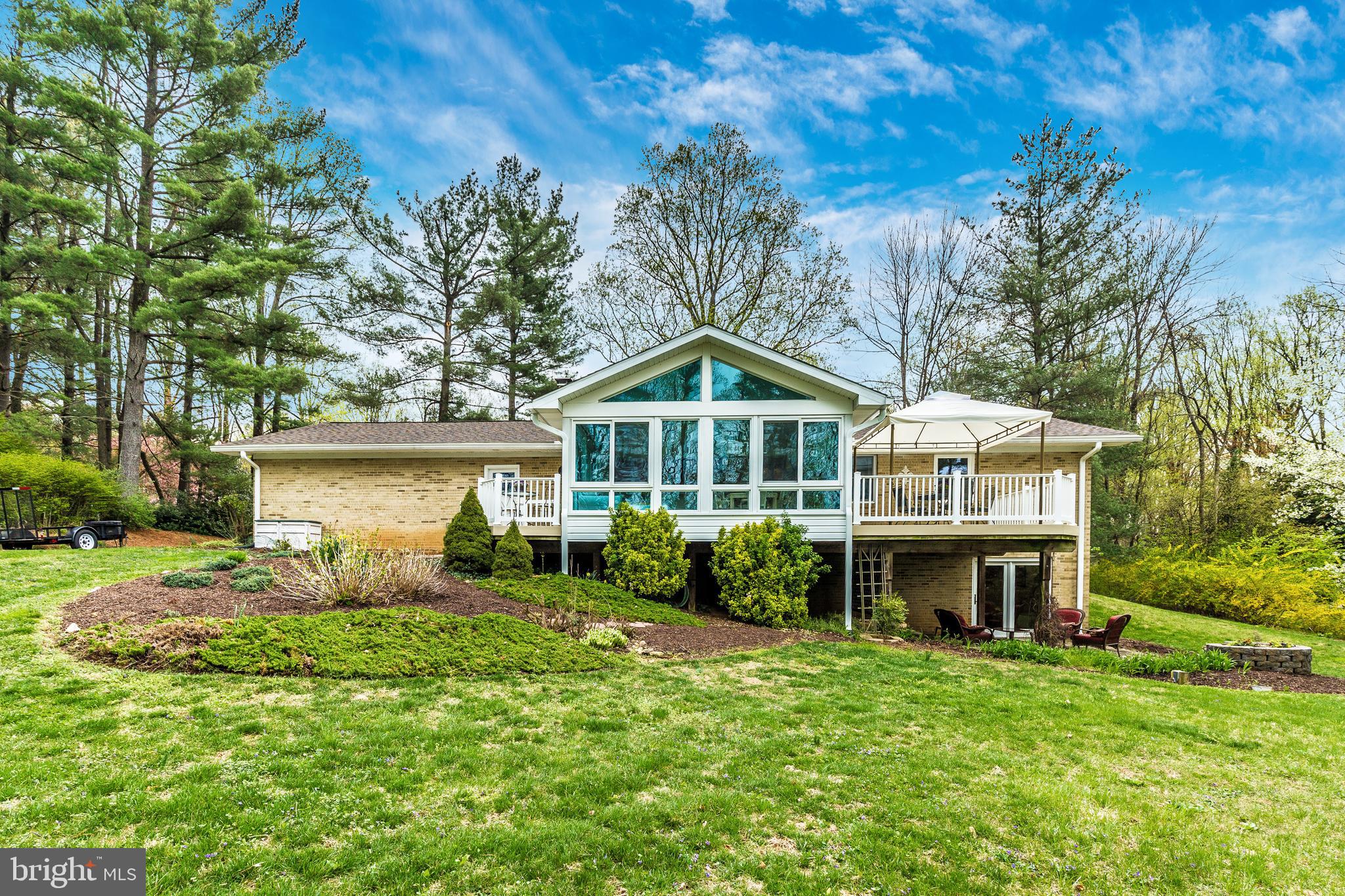 5506 Woodlyn Road Frederick, MD 21703 - Photo 43 of 51 a front view of a house with garden